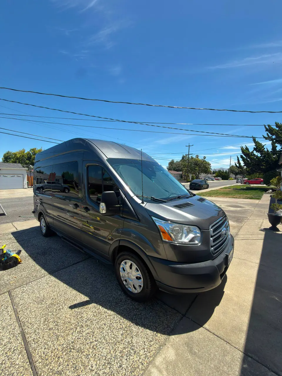 Black passenger van after custom mobile detailing by JBS Detailing