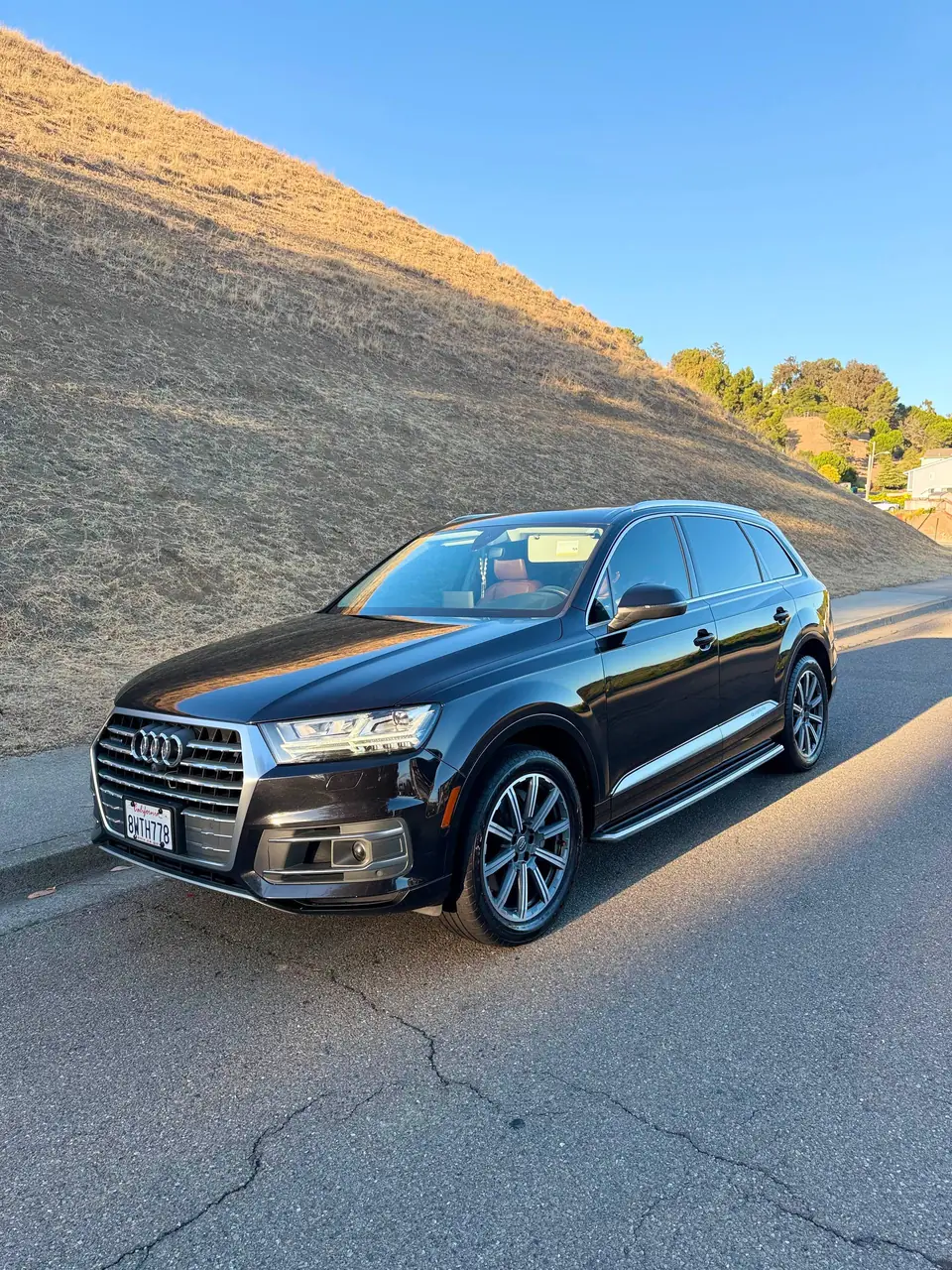Black luxury SUV with a deep polished shine